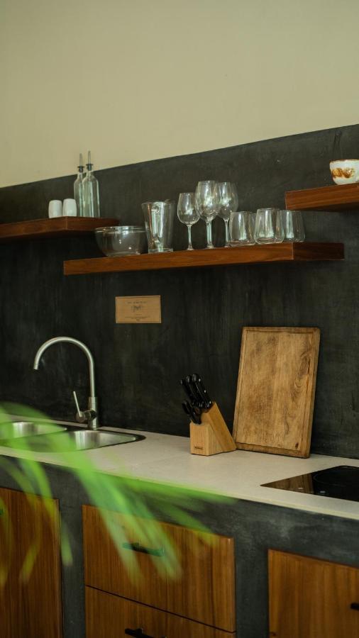Xperience Tulum Hotel Exterior photo A kitchen with a slate wall